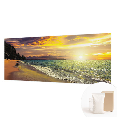 Wall mural depicting a beach at sunset