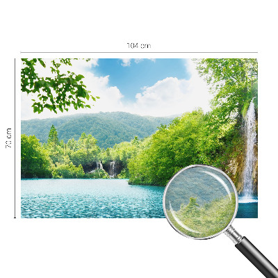 Large wallpaper mural featuring a natural waterfall scene