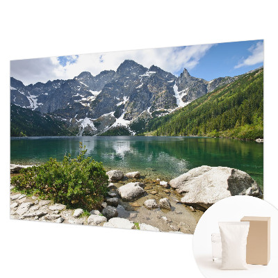 Wall mural with a mountain lake motif