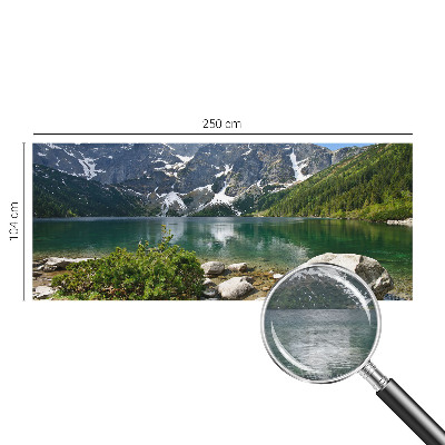 Wall mural with a mountain lake motif