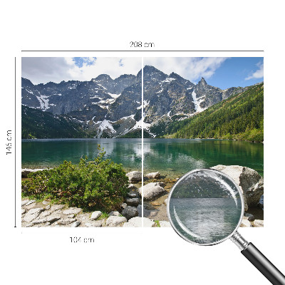 Wall mural with a mountain lake motif