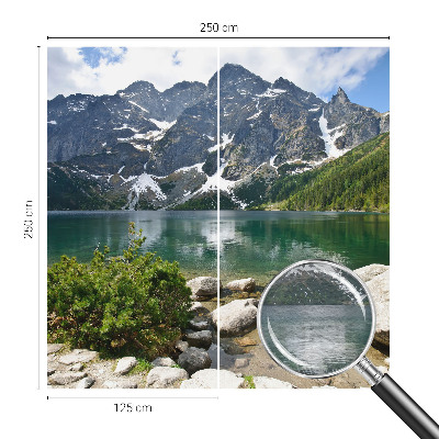 Wall mural with a mountain lake motif