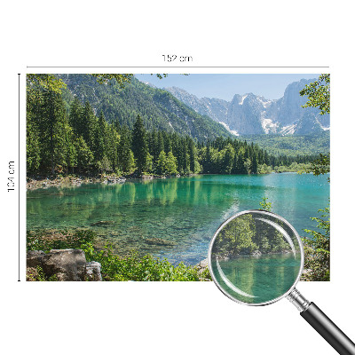 Large wall mural wallpaper featuring a green lake scene