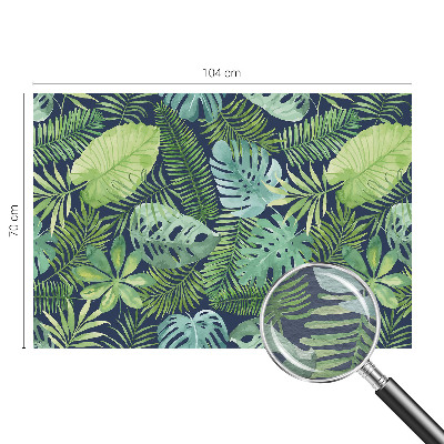Premium photo wallpaper with a tropical leaves design
