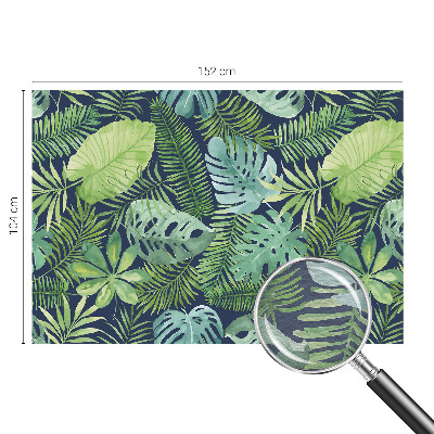 Premium photo wallpaper with a tropical leaves design