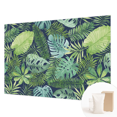 Premium photo wallpaper with a tropical leaves design