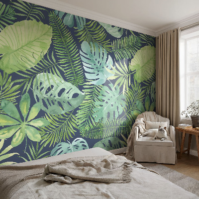 Premium photo wallpaper with a tropical leaves design