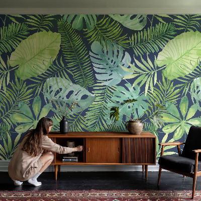 Premium photo wallpaper with a tropical leaves design