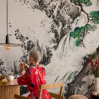 Large wall mural featuring a natural waterfall scene