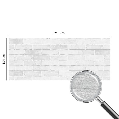 Non-woven wall mural with a brick wall design