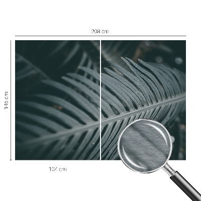 Large wall mural wallpaper with a green leaf design
