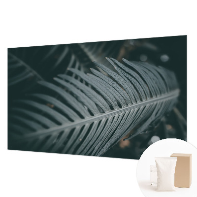 Large wall mural wallpaper with a green leaf design