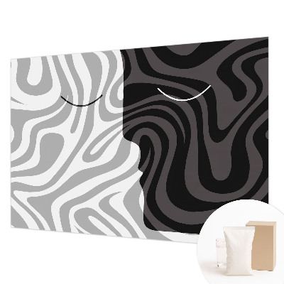 Premium photo wallpaper with an abstract faces design