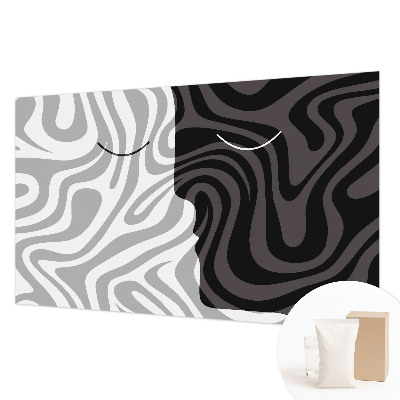 Premium photo wallpaper with an abstract faces design