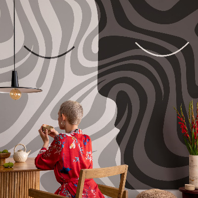 Premium photo wallpaper with an abstract faces design
