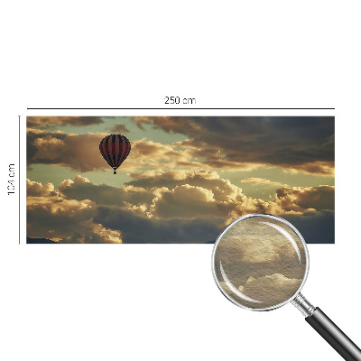 Wall mural for living room with a balloon drifting among the clouds