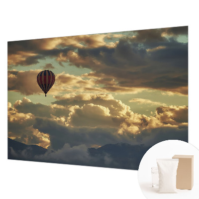 Wall mural for living room with a balloon drifting among the clouds