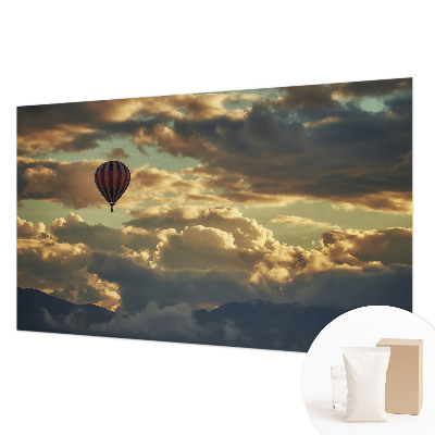 Wall mural for living room with a balloon drifting among the clouds