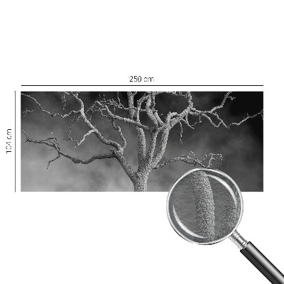 Non-woven wall mural with a misty tree design