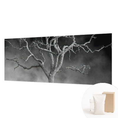 Non-woven wall mural with a misty tree design