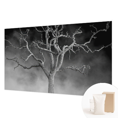 Non-woven wall mural with a misty tree design