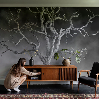 Non-woven wall mural with a misty tree design