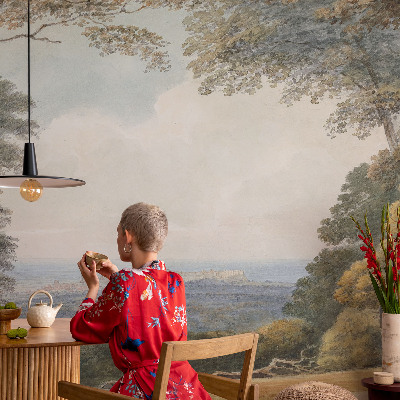Large wallpaper mural with a wooded landscape