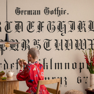 Wallpaper mural for living room with a Gothic letter motif
