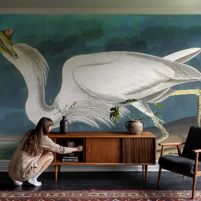 Wall mural for living room featuring a bird holding a fish motif