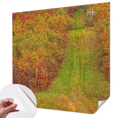 Removable wall mural with autumn colors motif