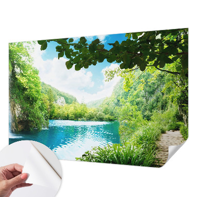 Baby room wall mural with a natural oasis motif