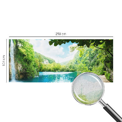 Baby room wall mural with a natural oasis motif