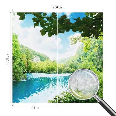 Baby room wall mural with a natural oasis motif