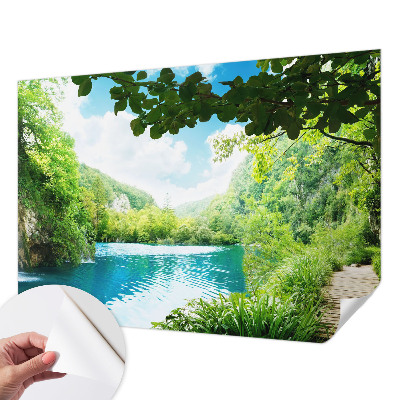 Baby room wall mural with a natural oasis motif
