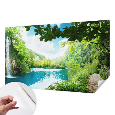 Baby room wall mural with a natural oasis motif