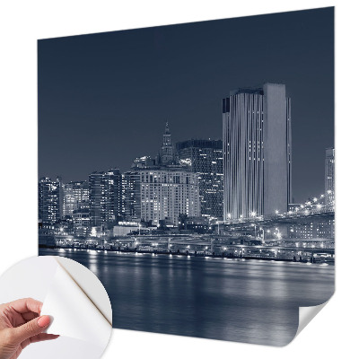 Stick-on wall mural featuring a night city scene