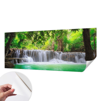 Removable wall mural wallpaper with a forest waterfall design