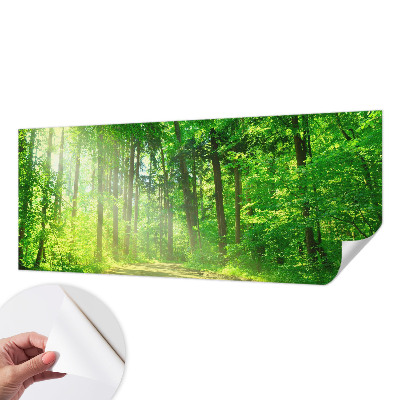 Self-adhesive wall mural with a forest path motif