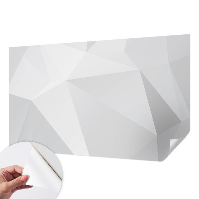 Removable wall mural with a gray triangle pattern