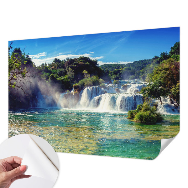 Nursery wall mural with a waterfall landscape design