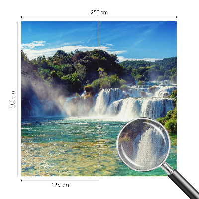 Nursery wall mural with a waterfall landscape design