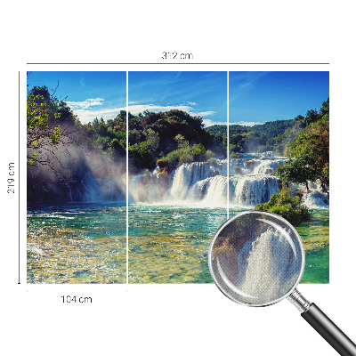Nursery wall mural with a waterfall landscape design