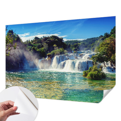 Nursery wall mural with a waterfall landscape design