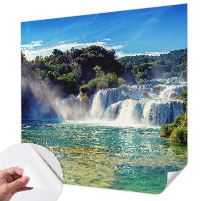 Nursery wall mural with a waterfall landscape design
