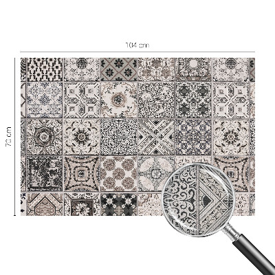 Self-adhesive wall mural featuring tile patterns