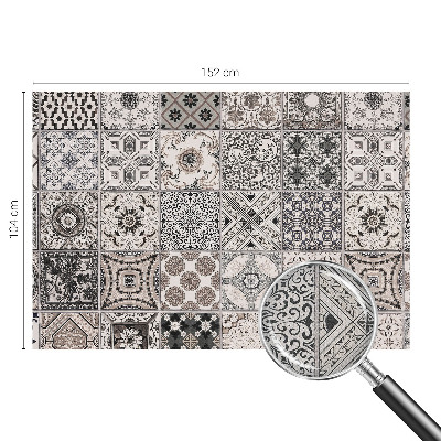 Self-adhesive wall mural featuring tile patterns
