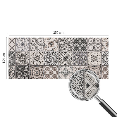 Self-adhesive wall mural featuring tile patterns
