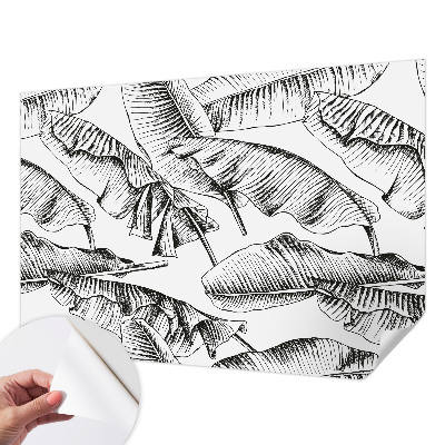 Stick-on wall mural with a banana leaf pattern