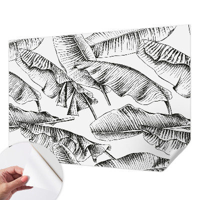 Stick-on wall mural with a banana leaf pattern
