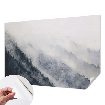 Removable wall mural with a misty mountain design